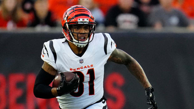 Aug 12, 2022; Cincinnati, Ohio, USA; Cincinnati Bengals tight end Thaddeus Moss (81) runs with a the ball in the first half against Arizona Cardinals at Paycor Stadium.